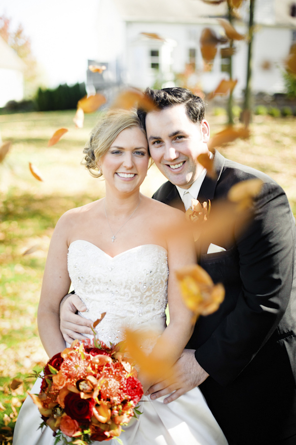 portrait of the newlywed amidst falling leaves - wedding photo by top Portland, Oregon wedding photographer Aaron Courter